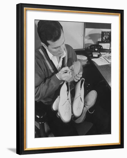 Pop Singer Pat Boone Autographing His White Buck Leather Shoes for Charity-Ralph Morse-Framed Premium Photographic Print
