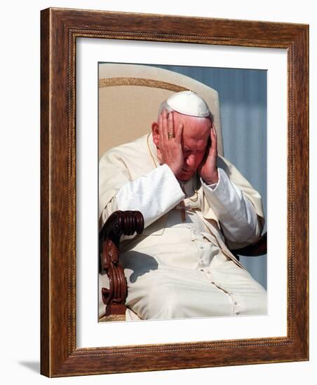 Pope John Paul II Holds His Head During the Weekly Open-Air General Audience-null-Framed Photographic Print