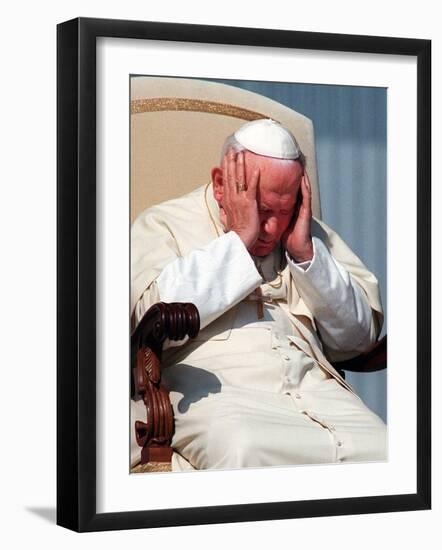 Pope John Paul II Holds His Head During the Weekly Open-Air General Audience-null-Framed Photographic Print