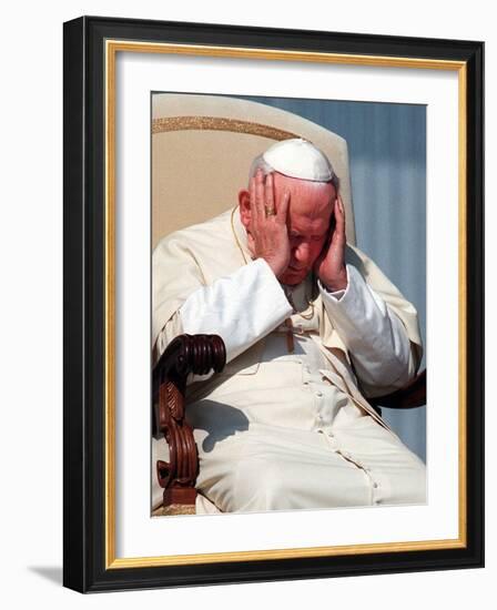 Pope John Paul II Holds His Head During the Weekly Open-Air General Audience-null-Framed Photographic Print