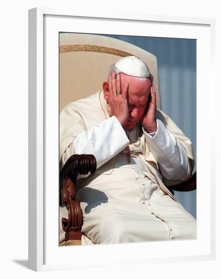 Pope John Paul II Holds His Head During the Weekly Open-Air General Audience-null-Framed Photographic Print