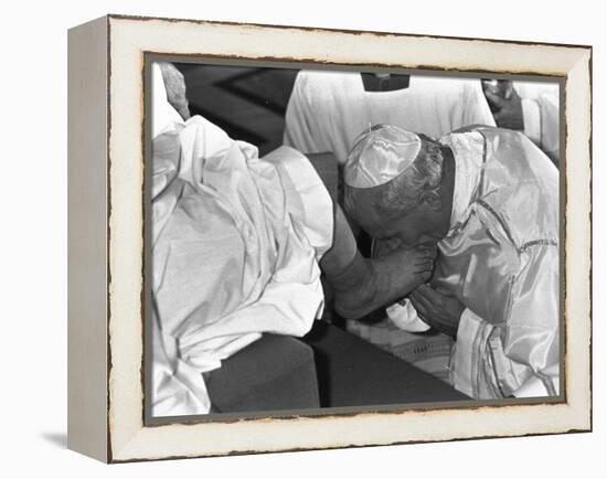 Pope John Paul II Kisses the Feet of One of 12 Mentally Retarded Italians-null-Framed Premier Image Canvas