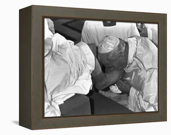 Pope John Paul II Kisses the Feet of One of 12 Mentally Retarded Italians-null-Framed Premier Image Canvas