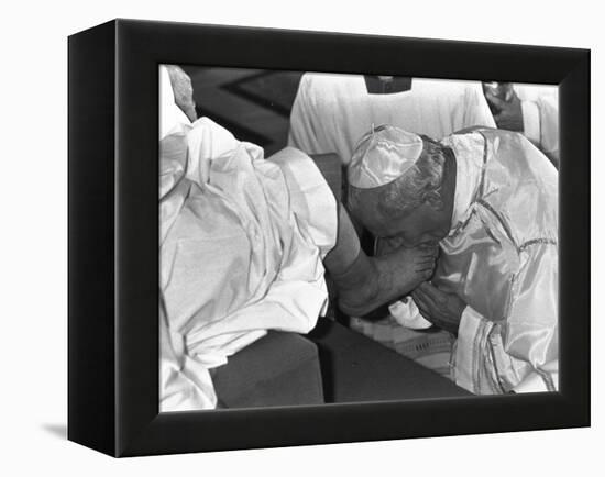 Pope John Paul II Kisses the Feet of One of 12 Mentally Retarded Italians-null-Framed Premier Image Canvas