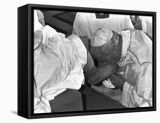 Pope John Paul II Kisses the Feet of One of 12 Mentally Retarded Italians-null-Framed Premier Image Canvas