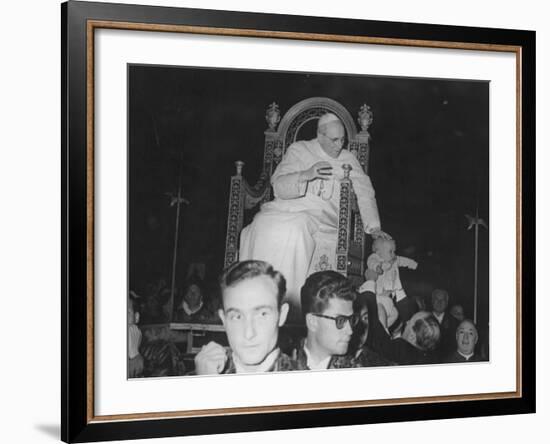 Pope Pius XII Putting Hand on Baby's Head to Bless it as He Is Being Carried in Papal Chair-null-Framed Premium Photographic Print