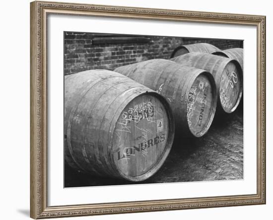 Port of London: Sherry from Spain Waiting on the Docks for Storage in the Vaults-Carl Mydans-Framed Premium Photographic Print