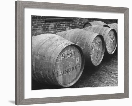 Port of London: Sherry from Spain Waiting on the Docks for Storage in the Vaults-Carl Mydans-Framed Premium Photographic Print