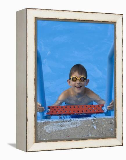 Portrait of 9 Year Old Boy in Swimming Pool, Kiamesha Lake, New York, USA-Paul Sutton-Framed Premier Image Canvas