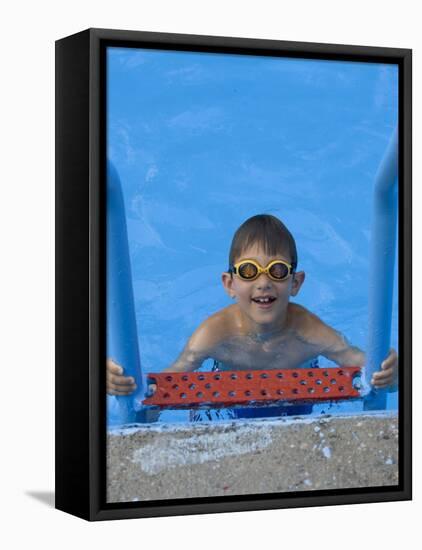 Portrait of 9 Year Old Boy in Swimming Pool, Kiamesha Lake, New York, USA-Paul Sutton-Framed Premier Image Canvas