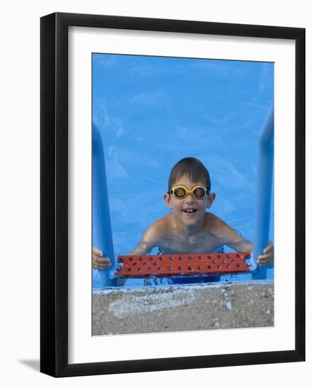 Portrait of 9 Year Old Boy in Swimming Pool, Kiamesha Lake, New York, USA-Paul Sutton-Framed Photographic Print