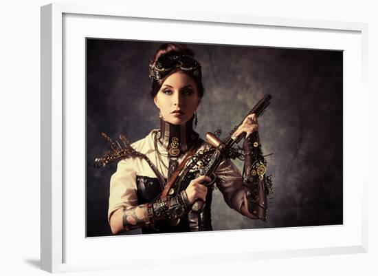 Portrait Of A Beautiful Steampunk Woman Holding A Gun Over Grunge Background-prometeus-Framed Art Print