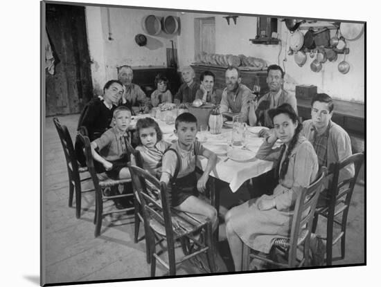 Portrait of a Family of Tuscan Tennat Farmers Sitting around Dinner Table-Alfred Eisenstaedt-Mounted Photographic Print