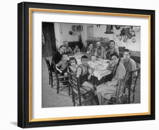 Portrait of a Family of Tuscan Tennat Farmers Sitting around Dinner Table-Alfred Eisenstaedt-Framed Photographic Print