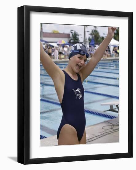 Portrait of a Joyous Girl Standing Beside a Swimming Pool-null-Framed Photographic Print
