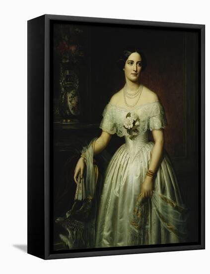 Portrait of a Lady Standing Three-Quarter Length Wearing a White Dress-August Schiott-Framed Premier Image Canvas