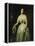 Portrait of a Lady Standing Three-Quarter Length Wearing a White Dress-August Schiott-Framed Premier Image Canvas