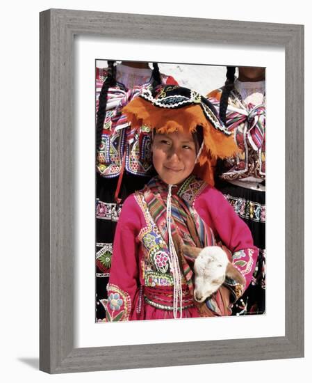 Portrait of a Local Smiling Peruvian Girl in Traditional Dress, Holding a Young Animal, Cuzco, Peru-Gavin Hellier-Framed Photographic Print