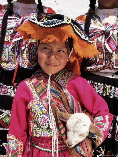 Portrait Of A Local Smiling Peruvian Girl In Traditional Dress Holding A Young Animal Cuzco Peru Photographic Print Gavin Hellier Art Com