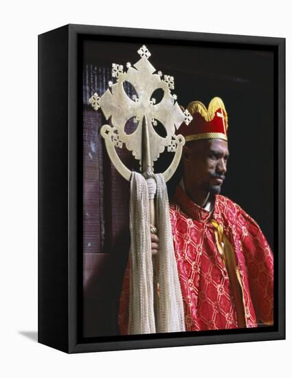 Portrait of a Man Holding a Christian Symbol, Bieta Golgotha, Lalibela, Wollo Region, Ethiopia-Bruno Barbier-Framed Premier Image Canvas