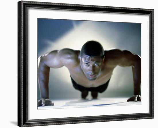 Portrait of a Mid Adult Man Exercising-null-Framed Photographic Print