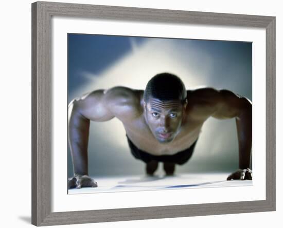 Portrait of a Mid Adult Man Exercising-null-Framed Photographic Print