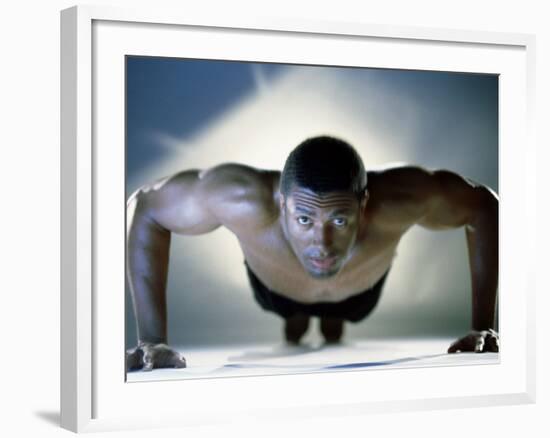 Portrait of a Mid Adult Man Exercising-null-Framed Photographic Print