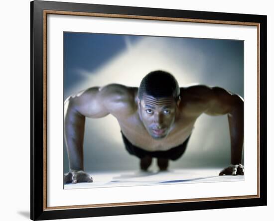 Portrait of a Mid Adult Man Exercising-null-Framed Photographic Print