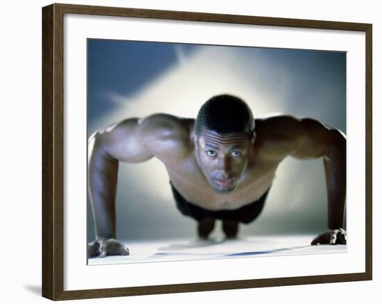 Portrait of a Mid Adult Man Exercising-null-Framed Photographic Print