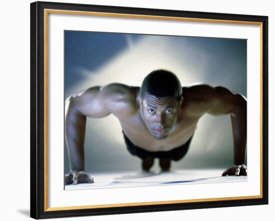 Portrait of a Mid Adult Man Exercising-null-Framed Photographic Print