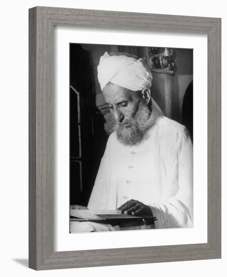 Portrait of a Moslem Imam Reading the Koran in the Jami' Masjid, the Largest Mosque in India-null-Framed Photographic Print