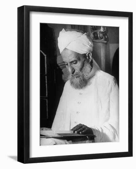Portrait of a Moslem Imam Reading the Koran in the Jami' Masjid, the Largest Mosque in India-null-Framed Photographic Print
