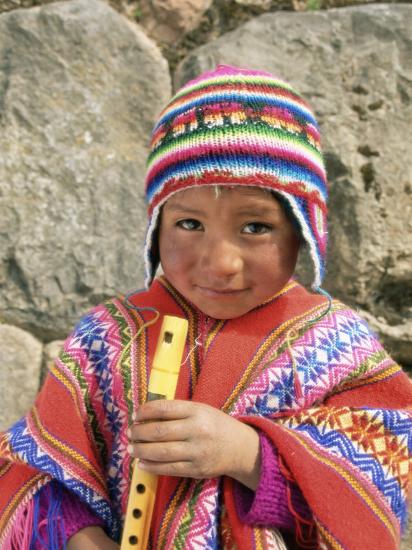 Portrait Of A Peruvian Boy In A Knitted Hat Playing The Flute Near Cuzco Peru South America Photographic Print Gavin Hellier Art Com