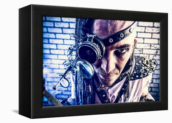 Portrait Of A Steampunk Man With A Mechanical Devices Over Brick Wall-prometeus-Framed Stretched Canvas
