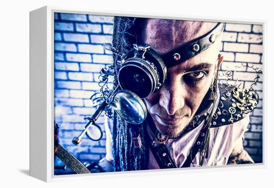 Portrait Of A Steampunk Man With A Mechanical Devices Over Brick Wall-prometeus-Framed Stretched Canvas