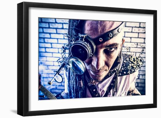 Portrait Of A Steampunk Man With A Mechanical Devices Over Brick Wall-prometeus-Framed Art Print