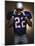 Portrait of an American Football Player Removing His Helmet-null-Mounted Photographic Print