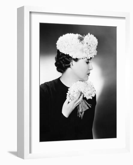 Portrait of an Elegant Woman Holding a Bouquet of Flowers-null-Framed Photo