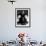 Portrait of Artist Georgia O'Keeffe Holding a Book by Leonard Baskinin Her Bedroom-John Loengard-Framed Premium Photographic Print displayed on a wall