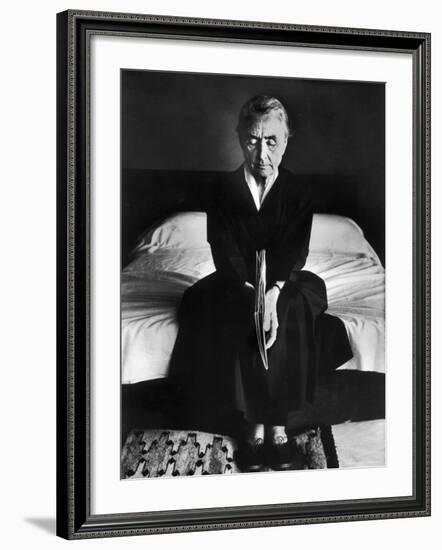 Portrait of Artist Georgia O'Keeffe Holding a Book by Leonard Baskinin Her Bedroom-John Loengard-Framed Premium Photographic Print