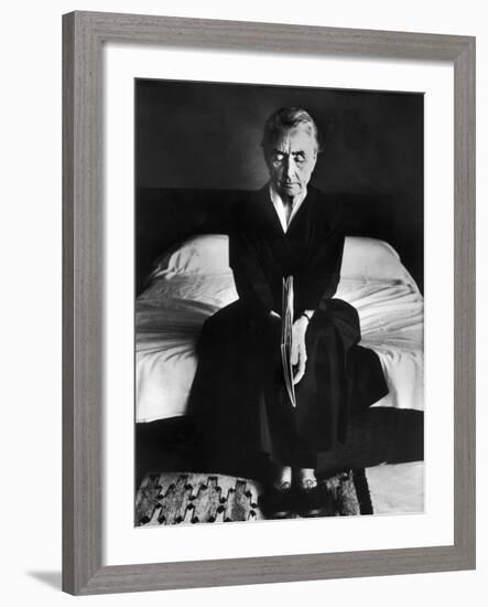 Portrait of Artist Georgia O'Keeffe Holding a Book by Leonard Baskinin Her Bedroom-John Loengard-Framed Premium Photographic Print
