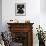 Portrait of Artist Georgia O'Keeffe Holding a Book by Leonard Baskinin Her Bedroom-John Loengard-Framed Premium Photographic Print displayed on a wall