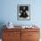 Portrait of Artist Georgia O'Keeffe Holding a Book by Leonard Baskinin Her Bedroom-John Loengard-Framed Premium Photographic Print displayed on a wall