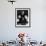 Portrait of Artist Georgia O'Keeffe Holding a Book by Leonard Baskinin Her Bedroom-John Loengard-Framed Premium Photographic Print displayed on a wall