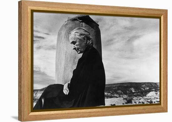 Portrait of Artist Georgia O'Keeffe Sitting on the Roof of Her Ghost Ranch Home-John Loengard-Framed Premier Image Canvas