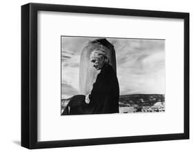 Portrait of Artist Georgia O'Keeffe Sitting on the Roof of Her Ghost Ranch Home-John Loengard-Framed Photographic Print