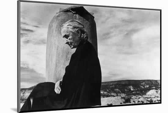 Portrait of Artist Georgia O'Keeffe Sitting on the Roof of Her Ghost Ranch Home-John Loengard-Mounted Photographic Print