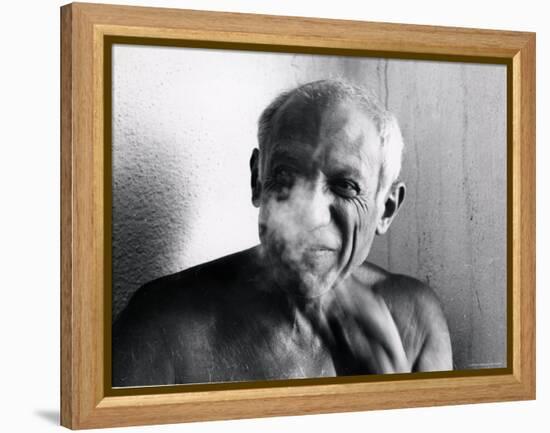 Portrait of Artist Pablo Picasso, Bare Chested and Smiling-Gjon Mili-Framed Premier Image Canvas