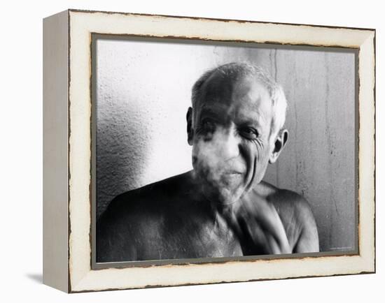 Portrait of Artist Pablo Picasso, Bare Chested and Smiling-Gjon Mili-Framed Premier Image Canvas