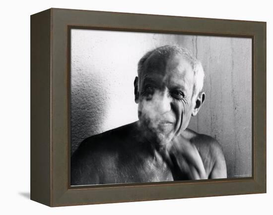 Portrait of Artist Pablo Picasso, Bare Chested and Smiling-Gjon Mili-Framed Premier Image Canvas